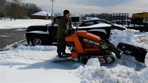 mini skid steer snow removal